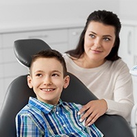 Mother and child in dental office for preventive dental care