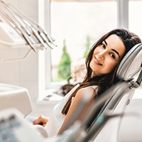 Female patient relaxing before dental implant placement surgery