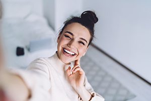 Confident woman snapping a selfie