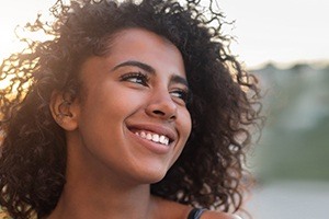 Woman smiling after gum contouring treatment