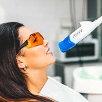 Woman receiving Zoom teeth whitening treatment