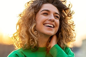 Woman with beautiful smile after dental bonding