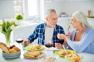 Happy older couple enjoying a meal together