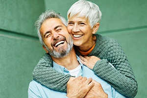 Smiling senior couple embracing each other