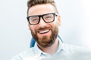 Man sharing healthy smile after biannual dental checkups