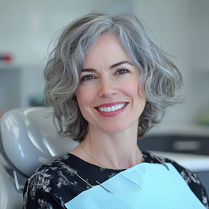 Portrait of smiling middle-aged dental patient