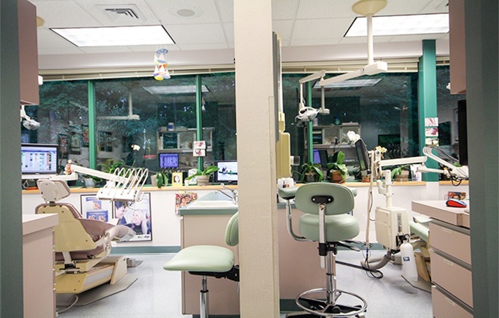 Hallway looking into two dental treatment rooms