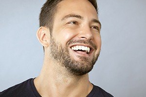 Man sharing healthy smile after scaling and root planing