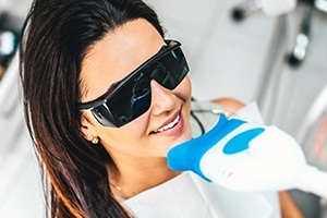 Patient receiving zoom in office teeth whitening