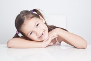 child smiling, back to school, young girl smiling