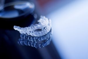 Aligners for Invisalign in Bloomfield on reflective tabletop